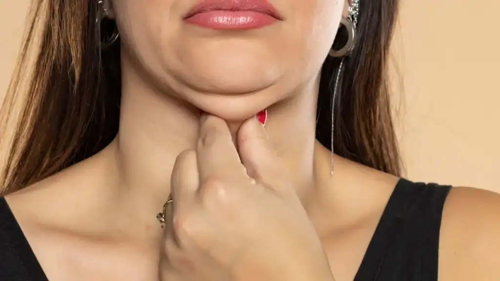 An image of a woman with double chin, sad, worried : Non Surgical Double Chin Removal Treatment in Skegness, UK